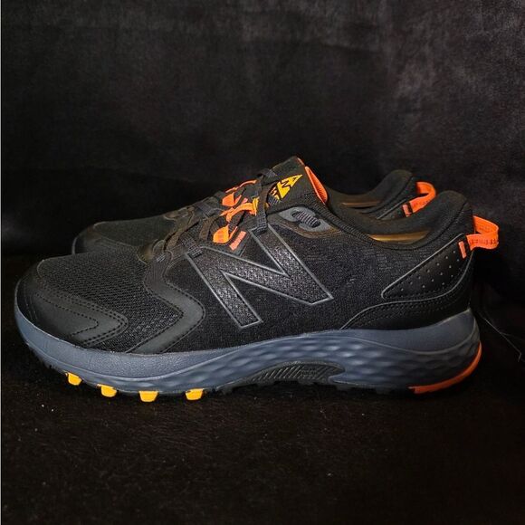 New Balance Men\'s Black and Orange Trail Shoes Size 12